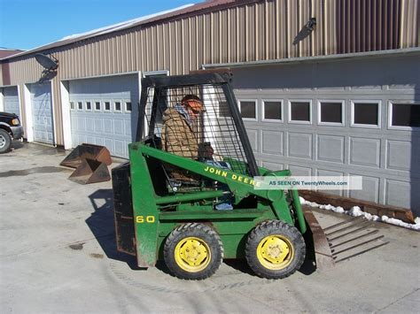 john deere skid loader models|john deere 60 skid loader.